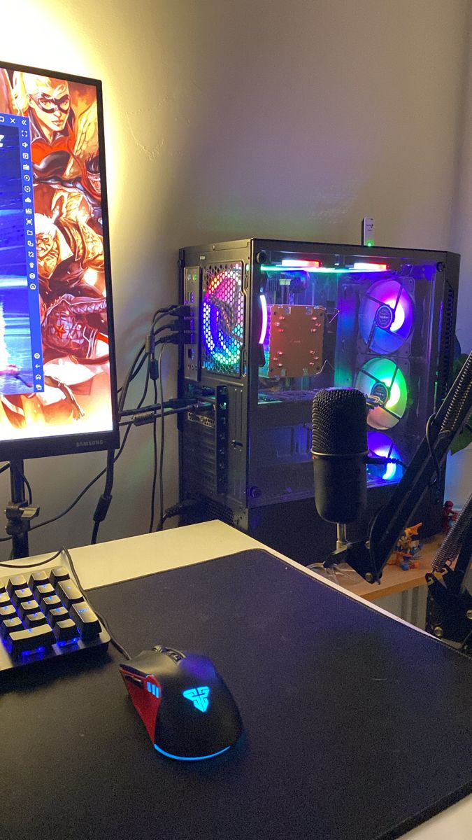 a computer desk with a keyboard, mouse and monitor