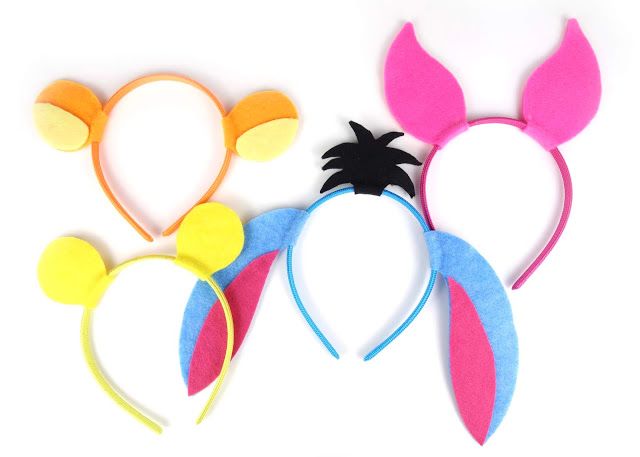 three ears are shown on top of each other, one is pink and the other is blue