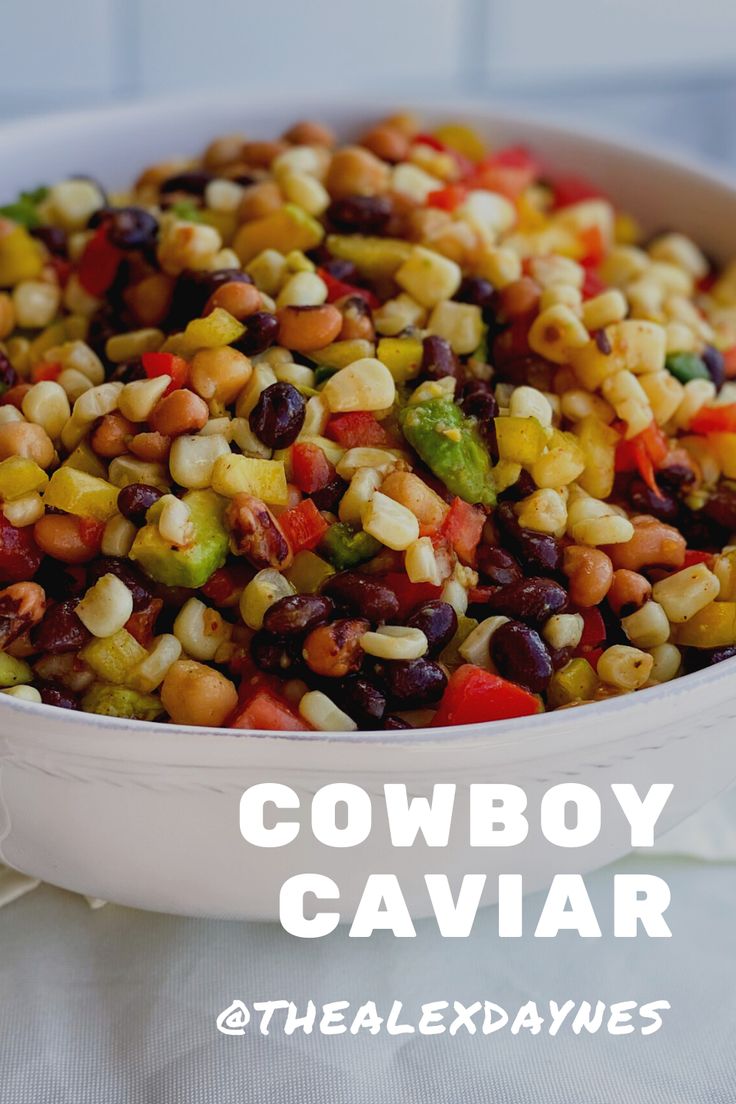 a white bowl filled with corn and black beans