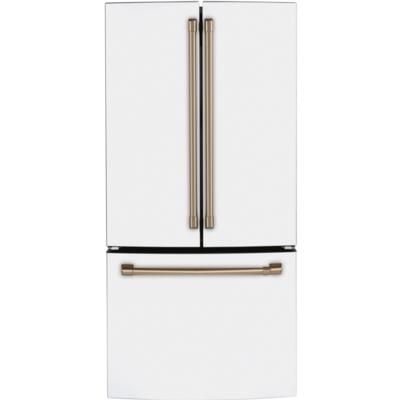 a white refrigerator freezer sitting next to a metal handle on an oven door drawer