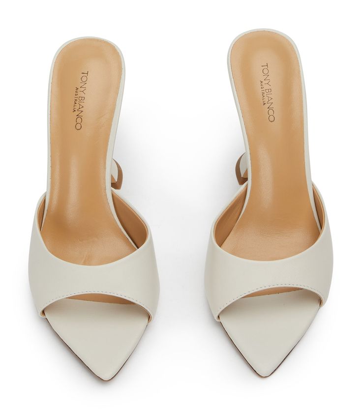 Pointed perfection, the Marcel mules are designed with a sleek and paired back shape and feature an open pointed toe-shape, a low cut rounded vamp and a chic hourglass shaped heel. With a quality luxe leather upper, lining and cushioned sole this style is not to be missed. -Material: Leather Upper & Lining -Sole: Man-Made -Fit: True to size -Toe-shape: Pointed -Features: Hourglass shaped heel -Heel: 10.5cm Bridal Shoes Closed Toe, Wedding Shoes Thick Heel, White Heel Outfit, Cool Heels Unique, Comfortable Kitten Heels, Heels With Dress, Wedding Block Heels, Going Out Shoes, Office Heels