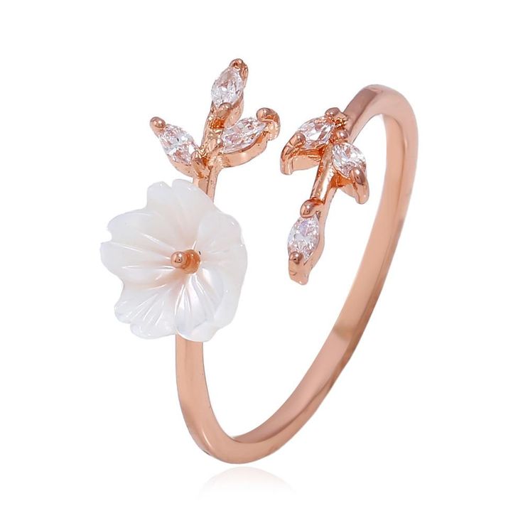 White flowers symbolize reverence and humility, purity and innocence or sympathy for a bereavement. Flaunt your whimsical charm in our Flower Branch Ring which shows off a sweet white flower motif and stunning CZ stones as "leaves". DETAILS & SIZE Composition: Gold, rose gold or silver plated over copper; 1x3mm CZ crystals, 8mm resin flower Measurements: width; 12mm, ring band: 14g, adjustable Read about how to care for your jewelry here. Shop Rings for more options to stack this with! Compl Cherry Blossom Ring, Gold Wrap Ring, Flower Engagement Ring, Gold Wrap, Knuckle Ring, Classy Jewelry, Wrap Rings, Flower Ring, Crystal Rings