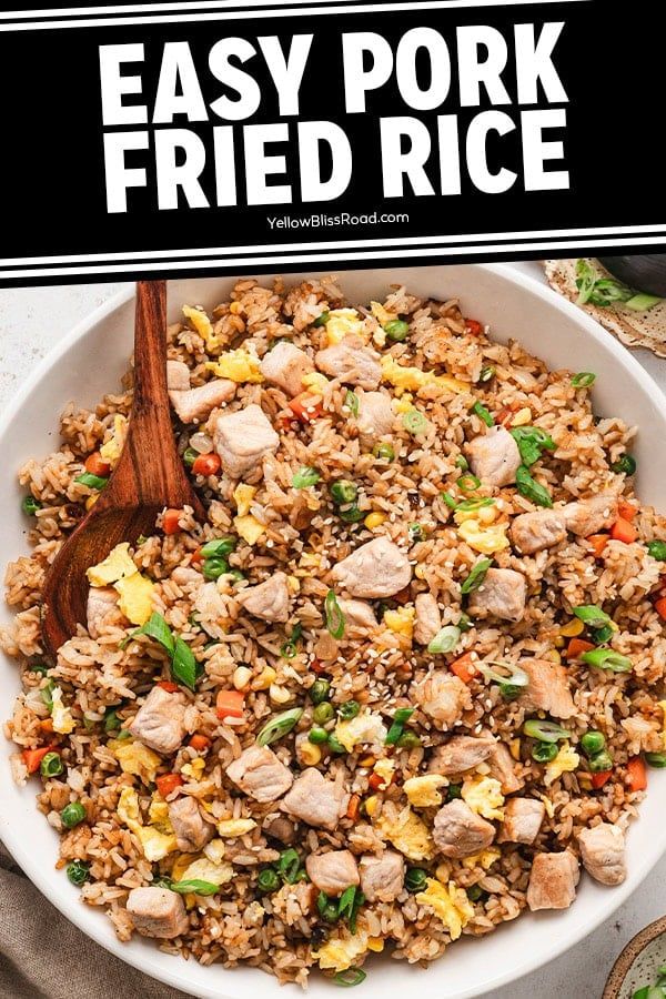 a bowl filled with fried rice and vegetables