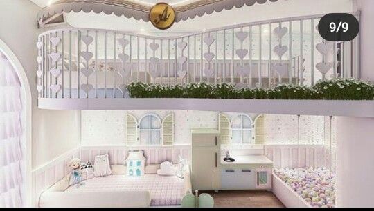 the interior of a doll house is decorated in white and pink colors with hearts on the balconies