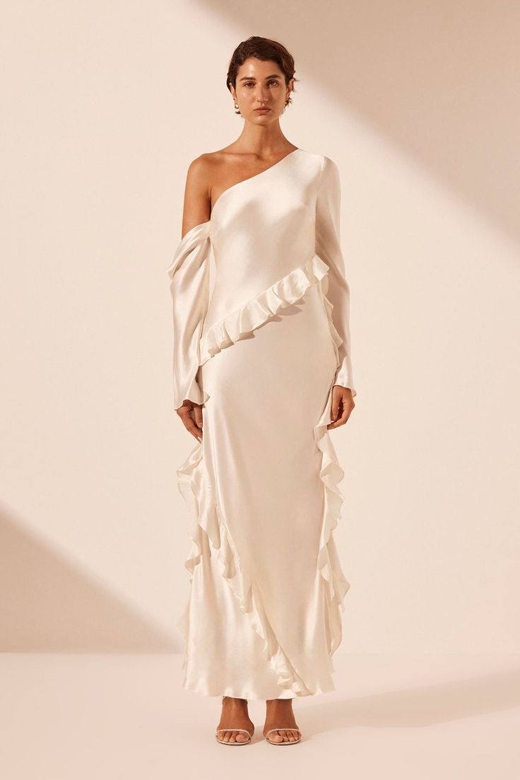 LOUELLA SILK ASYMMETRICAL LONG SLEEVE RUFFLE MAXI DRESS | IVORY | DRESSES | SHONA JOY Bridesmaid Pants, Maxi Silk Dress, Dress Ankle Length, 70s Glamour, Dress Asymmetrical, Ruffle Maxi Dress, Shona Joy, Ivory Dresses, Ruffled Maxi Dress