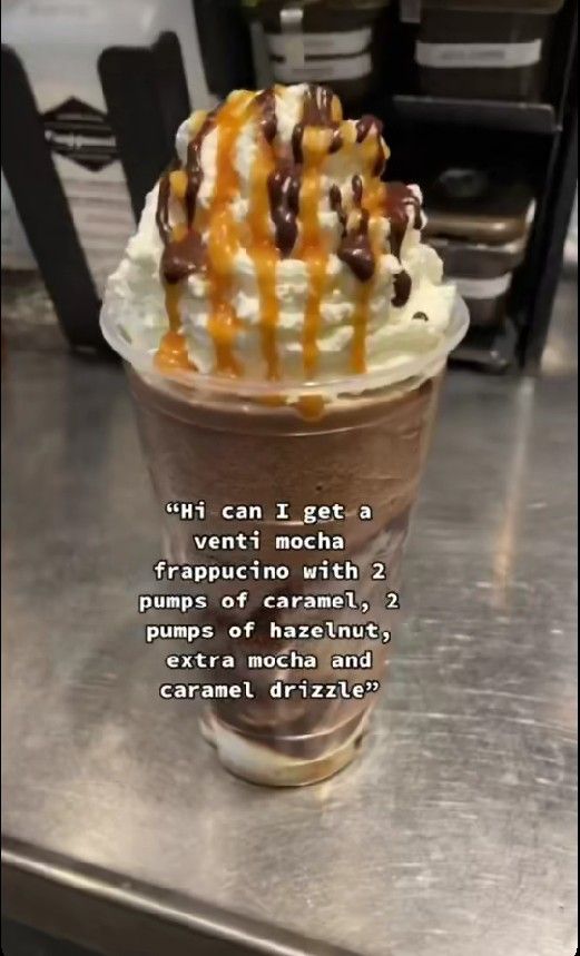 an ice cream sundae with chocolate and caramel drizzles on top