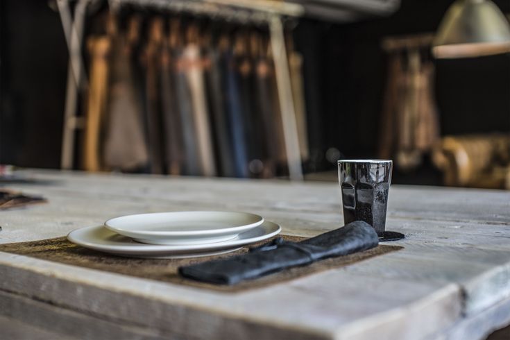 a table with plates and cups on it