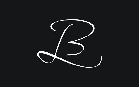 the letter b is drawn in white ink on a black background, and it appears to be handwritten