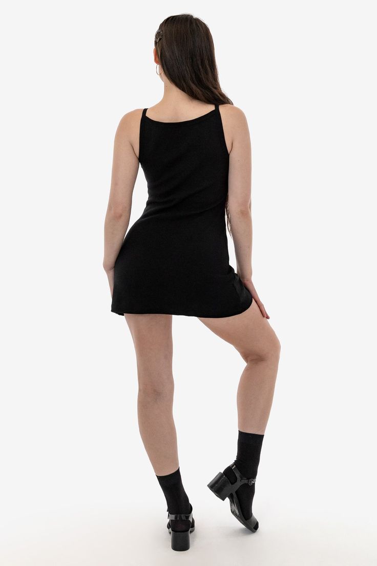 This classy high neck dress is made of a heavyweight, 100% cotton rib comparable to our bestselling RHR318GD Garment Dye Spaghetti Dress. This mini dress features a slightly flared skirt for everyday comfort and the thick textile provides a universally-flattering amount of structure. Pair this dress with our jelly sandals or a simple heel for an effortless look. Made in Los Angeles, Calif. Our experienced sewers earn up to $25 an hour and no less than $16; additionally workers have healthcare be Casual Bodycon Mini Slip Dress, Fitted Cotton Slip Dress, Fitted Sleeveless Slip Dress For Fall, Los Angeles Apparel Dress, Ribbed Cotton Mini Dress, 90s Boat Neck Dress, Casual Stretch Mini-length Slip Dress, Casual Black Ribbed Mini Dress, Ribbed Spaghetti Strap Mini Dress