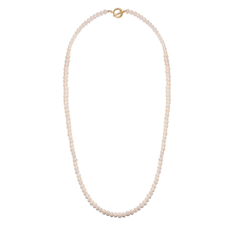 The Convertible Pearl Necklace features a strand of white pearls that can be worn long, doubled up or as a lariat with the toggle pulled through. While pretty on its own, customize it with clip-on charms for a unique take all your own. Classic Double Strand Pearl Chain Necklace, Classic Double Strand Pearl Charm Jewelry, Classic Long Pearl Necklace With Pendant, Classic Single Strand Lariat Necklace, Classic Pearl Lariat Necklace, Classic Long Pearl Drop Necklace, Classic Single Strand Pearl Necklace For Everyday, Classic Everyday Single Strand Pearl Necklace, Pearl White Lariat Necklace With Pearl Charm