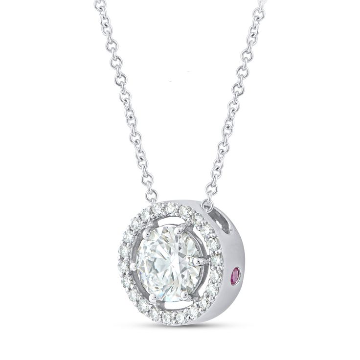 This elegant pendant showcases a stunning 1-carat round cut diamond, beautifully encircled by 22 smaller round diamonds totaling 1 1/4 carats. Set in 14k gold, the pendant is suspended on a non-removable chain, creating a seamless blend of sophistication and sparkle, perfect for any special occasion. NECKLACE DETAILS 14K Gold Chain is not removeable 1.5mm round genuine Ruby accent DIAMOND DETAILS Lab Grown Diamonds: 1.21 tcw Diamond Quantity: 23 Diamond Color: G Diamond Clarity: VS Setting: Prong Certification: IGL Certified White Diamond Necklace With Oval Pendant, White Brilliant Cut Diamond Necklace With Oval Pendant, White Diamond Oval Pendant Necklace, White Brilliant Cut Oval Pendant Diamond Necklace, Lab Grown Diamond Round Pendant Necklace With Brilliant Cut, White Oval Diamond Necklace With Brilliant Cut, White Diamond Necklace With Oval Pendant Accents, Oval White Diamond Necklace, White Oval Halo Setting Necklace