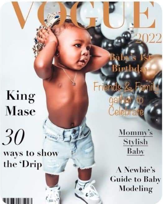 a magazine cover with an image of a baby on it's back and balloons in the background