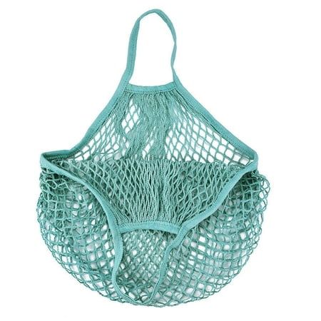 a green netted bag hanging from the side