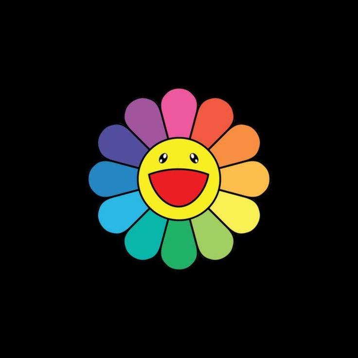 a colorful flower with a smiley face on it