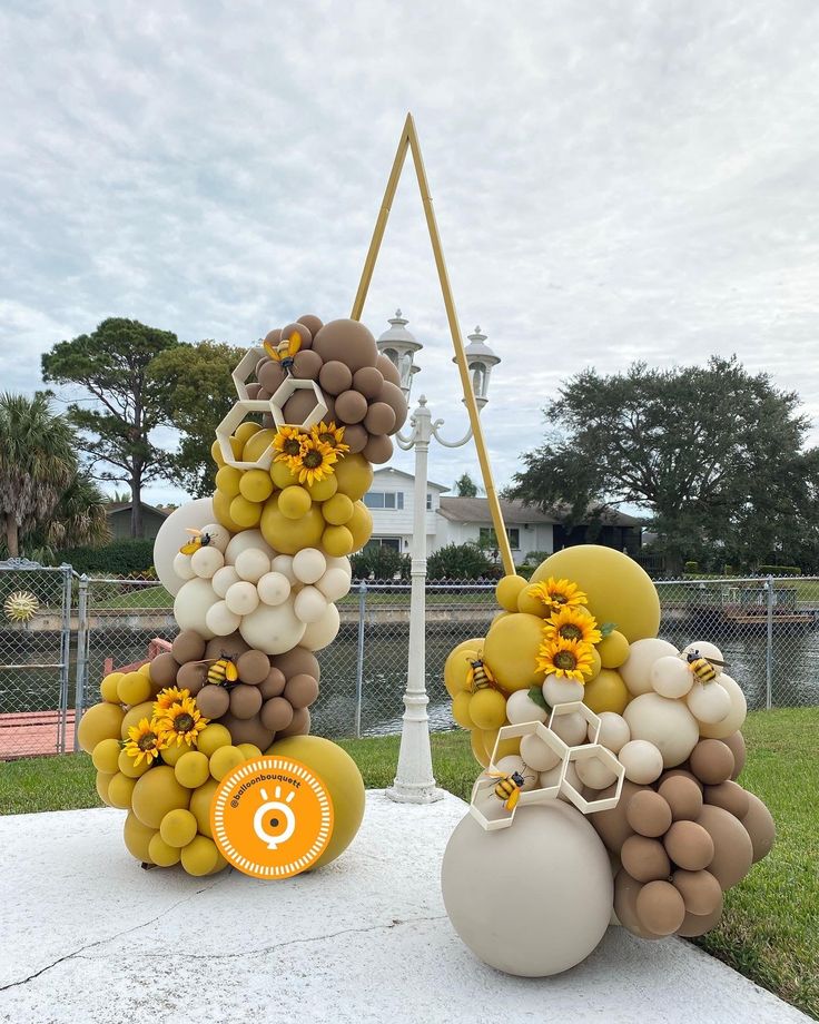 some balloons are stacked on top of each other in the shape of letters and numbers