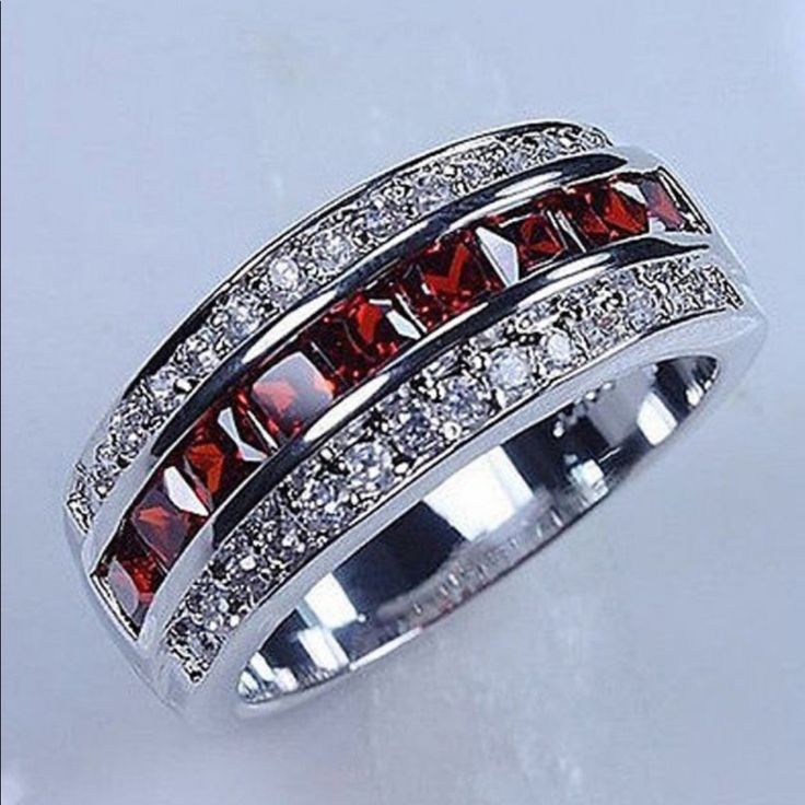 925 Ss Classic Ruby Res & White Cz Band Ring Metal: 925 Sterling Silver Color Stones Ruby Red Cz Color Stones: White Cz Stone Size 3mm Pretty Wedding Rings, Mens Rings For Sale, Garnet Wedding, Red Garnet Ring, Cocktail Jewelry, Silver Wedding Bands, Gem Ring, Band Jewelry, Silver Wedding Rings