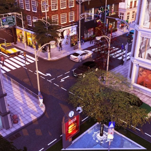 an aerial view of a city street at night