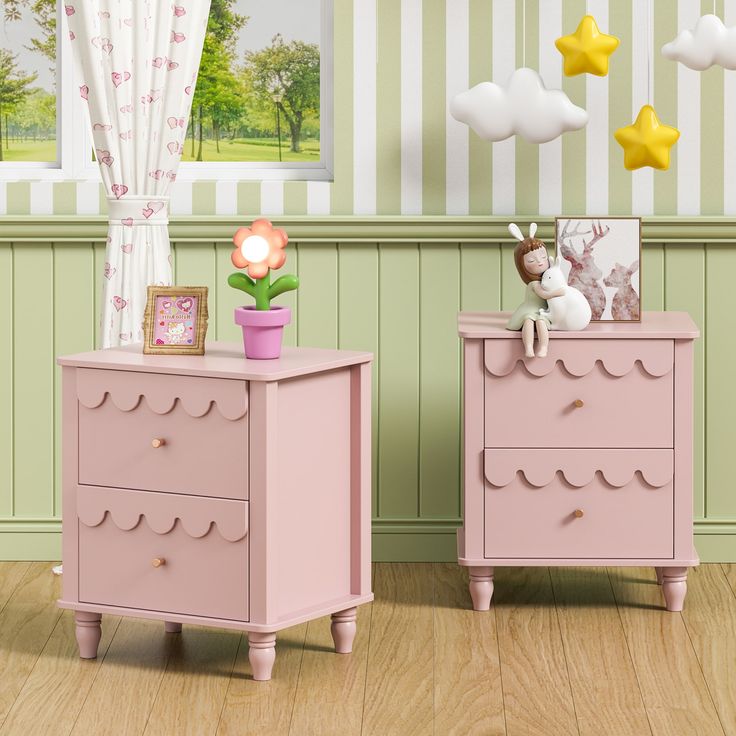 two pink dressers sitting next to each other in a room