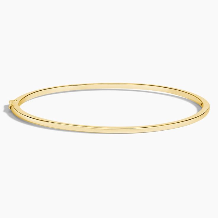 Whisper 6.5 In. Bangle Bracelet - 14K Yellow Gold. This 6.5-inch bangle embellishes the wrist with lustrous light for an elegant and stackable look. Formal 14k Gold Diamond Bangle Bracelet, Gold Hoop Bangle With Polished Finish, Classic Bangle With Gold Clasp, Classic Bangle Jewelry With Gold Clasp, Gold Hoop Bracelet With Polished Finish, Yellow Gold Bangle Bracelet With Gold Clasp, 14k Gold Bangle With Shiny Finish, Classic Everyday Luxury Bangle, Modern Gold Clasp Bangle Jewelry