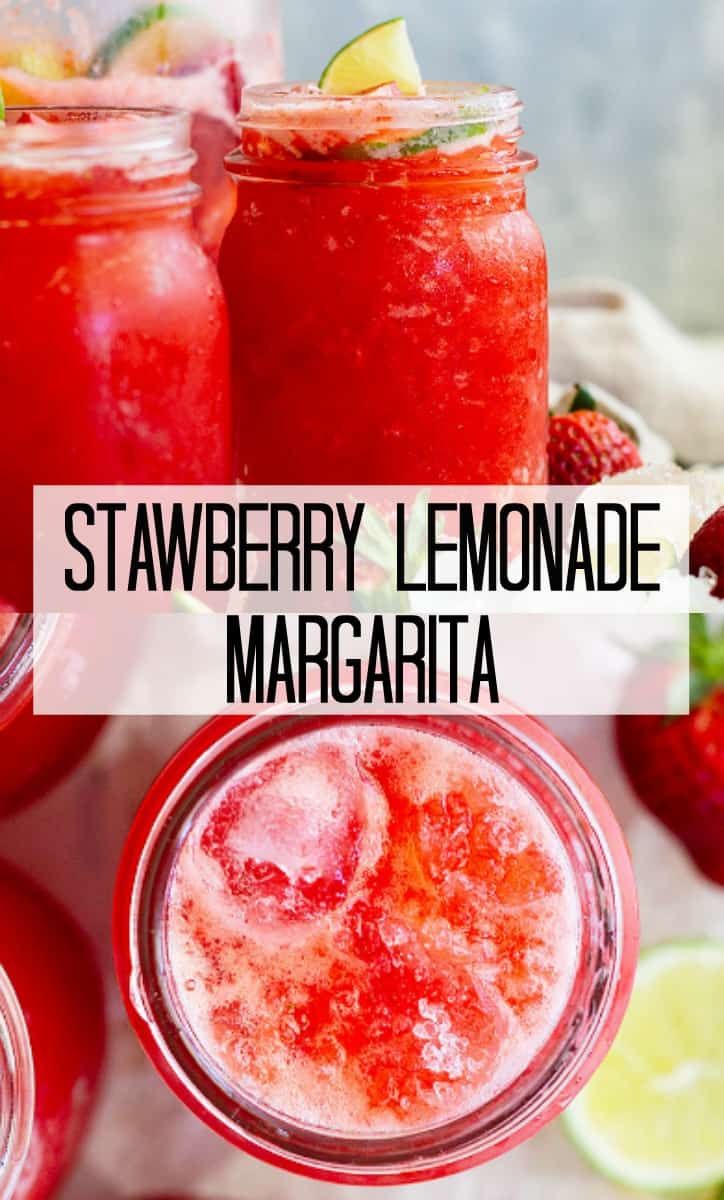 strawberry lemonade margarita in mason jars with limes and strawberries