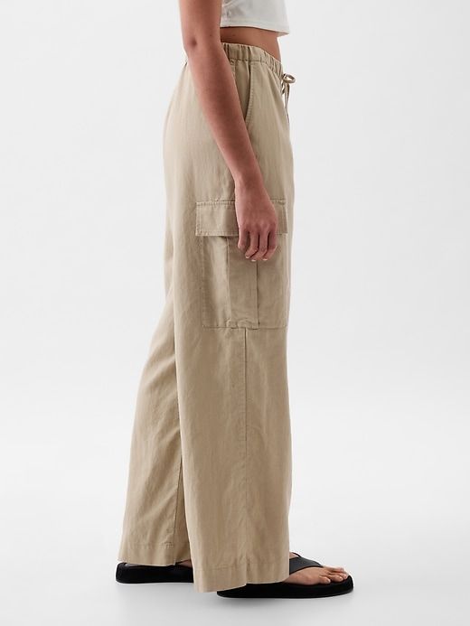 Gap Wide Leg Linen Pants, Gap Linen Spring Pants, Gap Linen Pants For Spring, Spring Gap Linen Pants, Casual Linen Pants By Gap, Casual Linen Parachute Pants With Cargo Pockets, Wide Leg Linen Cargo Pants For Loungewear, Wide Leg Linen Cargo Pants With Elastic Waistband, Spring Linen Parachute Pants With Cargo Pockets