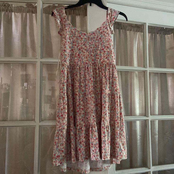 Floral Dress From Marshall’s Never Been Worn Before! Perfect For Spring/Summer Dressy Or Casual! Casual Printed A-line Sundress, Casual A-line Sundress For Brunch, Pink Flowy Breezy Dress, Casual Cotton Floral Dress For Vacation, Pink Ditsy Floral Print Sundress For Summer, Pink Ditsy Floral Print Sundress For Spring, Pink Ditsy Floral Print Dress For Vacation, Summer Knee-length Mini Dress With Ditsy Floral Print, Pink Ditsy Floral Print Dress For Beach