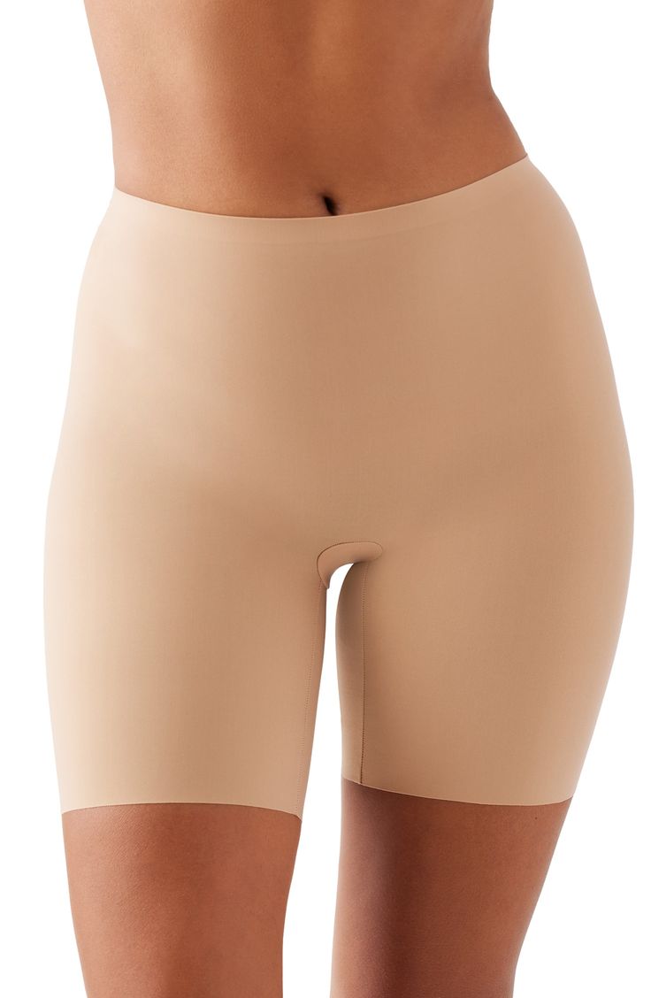 Get a sleek silhouette under outfits in these lightweight, superstretchy shaping shorts that offer allover, medium-level control and a line-free finish. 60% elastane, 40% polyamide Hand wash, dry flat Imported Fitted Elastane Shapewear In Short Length, Seamless Construction Fitted Biker Shorts, Compression Shapewear With Built-in Shorts, Elastane Shapewear Biker Shorts, Mid-thigh Length Elastane Biker Shorts Shapewear Style, Shaping Shapewear With Built-in Shorts In Elastane, Stretch Elastane Mid-thigh Shapewear, Shaping Smoothing Short Bottoms, Micro-elastic Smoothing Shorts Mid-thigh Length