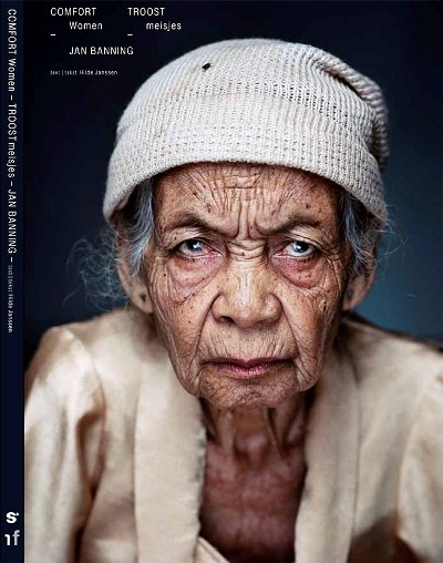 an old woman wearing a white hat and jacket on the cover of time out magazine