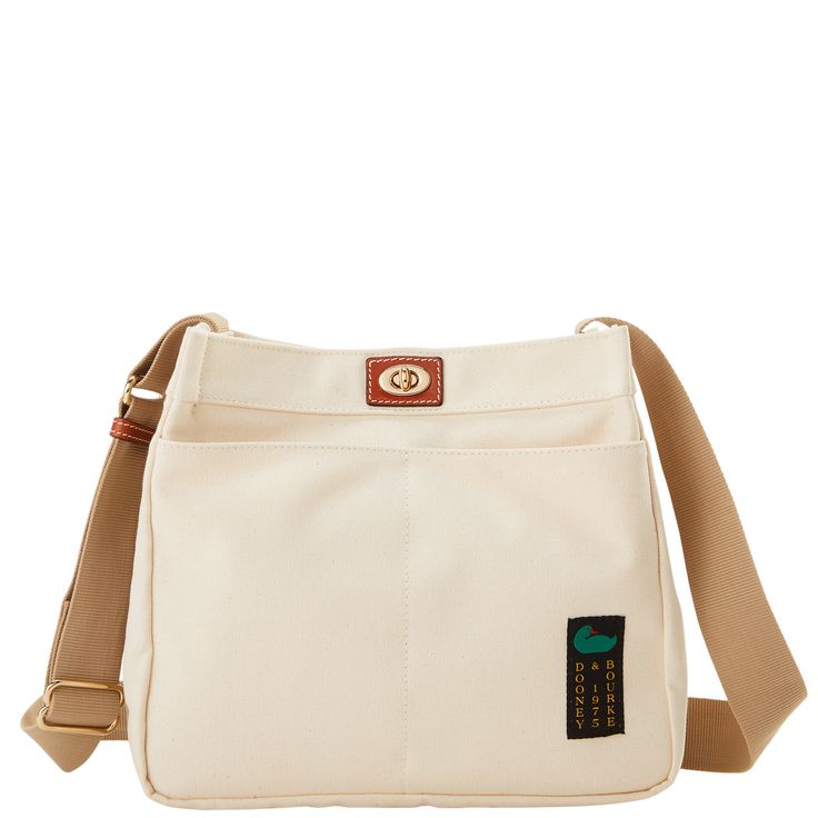 On The Go  This roomy crossbody, crafted from stunning lightweight Italian cotton canvas, will take what you need on the go with multiple pockets both inside and out. Solid Color Canvas Crossbody Bag With Removable Pouch, Cream Crossbody Canvas Travel Bag, Beige Canvas Crossbody Bag With Canvas Lining, Canvas Crossbody Shoulder Bag With Pockets, Functional Everyday Shoulder Bag With Flat Pocket, Everyday Functional Shoulder Bag With Flat Pocket, Canvas Crossbody Shoulder Bag With Cell Phone Pocket, Beige Crossbody Shoulder Bag With Canvas Lining, Everyday Crossbody Shoulder Bag With Canvas Lining