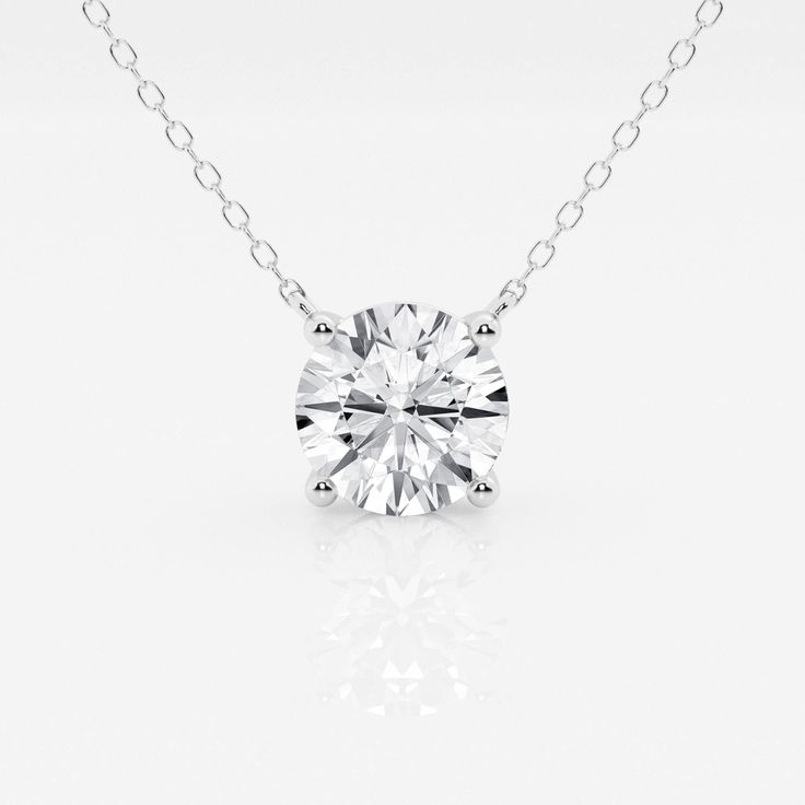 a diamond necklace on a white background