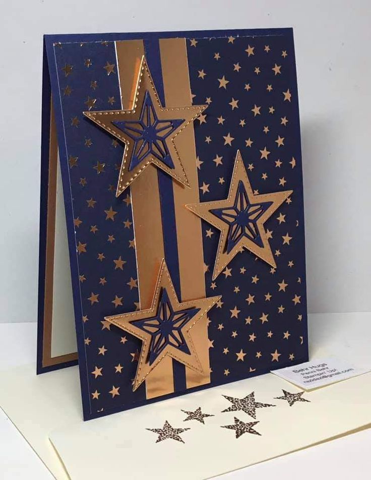 a blue card with gold stars on it