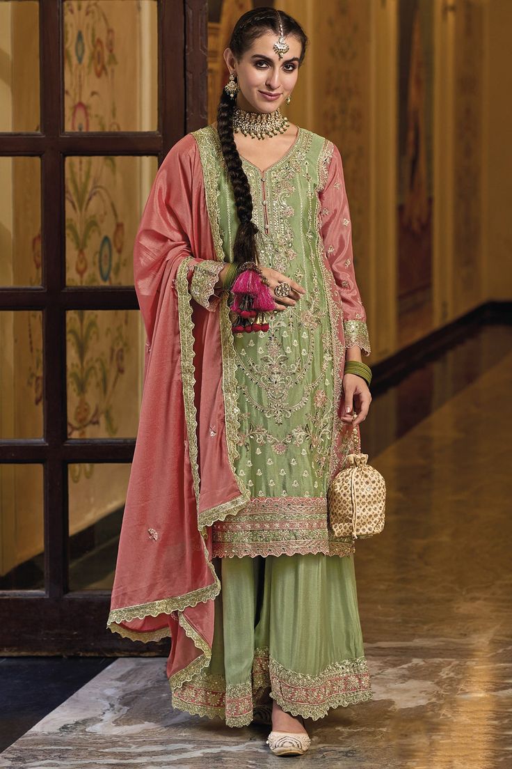 Description: Style and trend will be at the peak of your beauty when you attire this Pistachio Green Color chinon trendy palazzo suit. This attire is beautifully adorned with sequins embroidered work. Comes with Pistachio Green color chinon bottom and dupatta.This Suit is a suitable amalgamation of style and grace that is required from ethnic wear. The dress is ideal for any formal or informal gathering. Chest Size: Medium: 38 Inches Large: 40 Inches X-Large: 42 Inches XX-Large: 44 Inches XXX-La Pink Pakistani Dress, Pakistani Dresses Eid, Suit Designs Indian Style, Palazzo Dress, Gaun Fashion, Palazzo Suit, Heavy Work, Kurta Dress, Pakistani Salwar Kameez