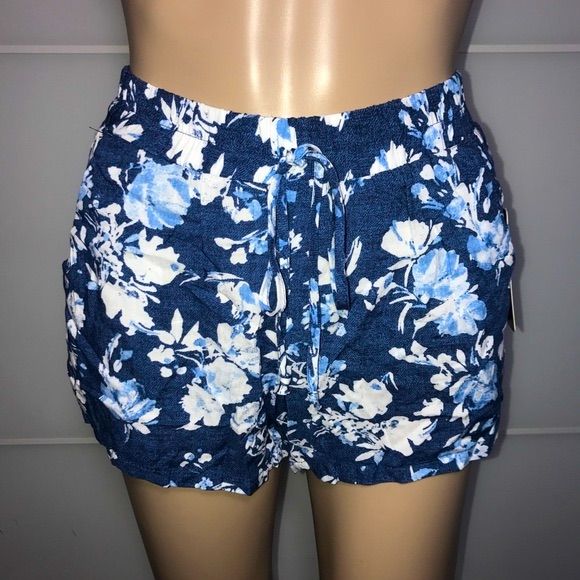 Bebop Blue Floral Shorts New With Tags Length: 11 Inches Blue Stretch Beach Shorts, Stretch Blue Beach Shorts, Blue Shorts For Beach Season Vacation, Blue Floral Print Beach Bottoms, Blue Floral Print Bottoms For Beach Season, Blue Beachwear Bottoms With Elastic Waistband, Blue Elastic Waistband Shorts For Summer, Beachy Blue Shorts, Blue Bottoms For Beach In Spring