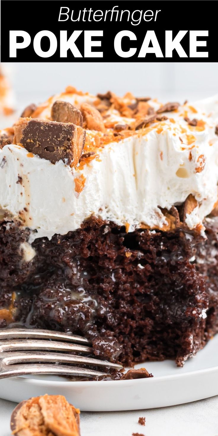 a close up of a piece of cake on a plate with a fork in it