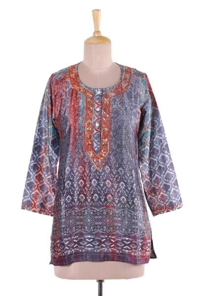 Designed by Shalabh this fashionable tunic from India features intricate printed patterns in tones of grey burnt sienna and buff. Beautiful floral motifs are embroidered by hand along this tunic's button-up neckline. Bohemian Multicolor Blouse For Eid, Bohemian Blouse With Printed Motifs For Eid, Bohemian Eid Tunic With Printed Motifs, Bohemian Tunic With Printed Motifs For Festive Occasions, Bohemian Multicolor Tunic With Printed Motifs, Bohemian Multicolor Printed Tunic, Bohemian Multicolor Printed Motifs Tunic, Festive Fall Kurta With Printed Motifs, Long Sleeve Paisley Print Kurta For Festive Occasions