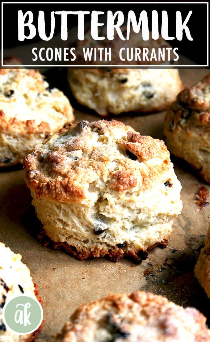 buttermilk scones with currans on a baking sheet and text overlay reads buttermilk scones with currans