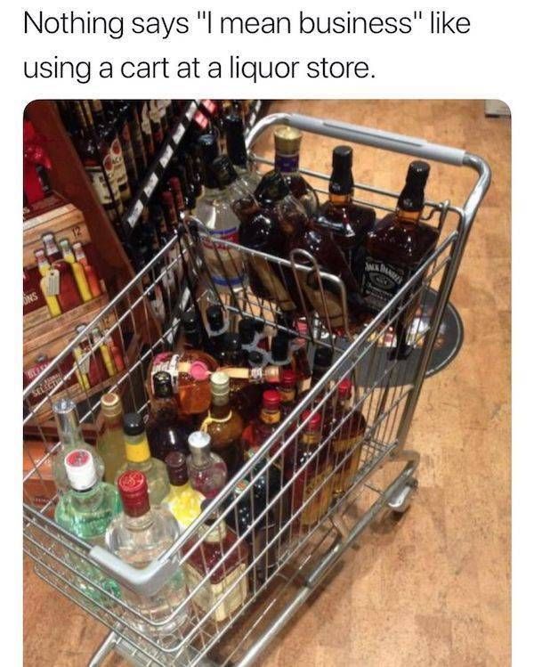 a shopping cart filled with lots of bottles