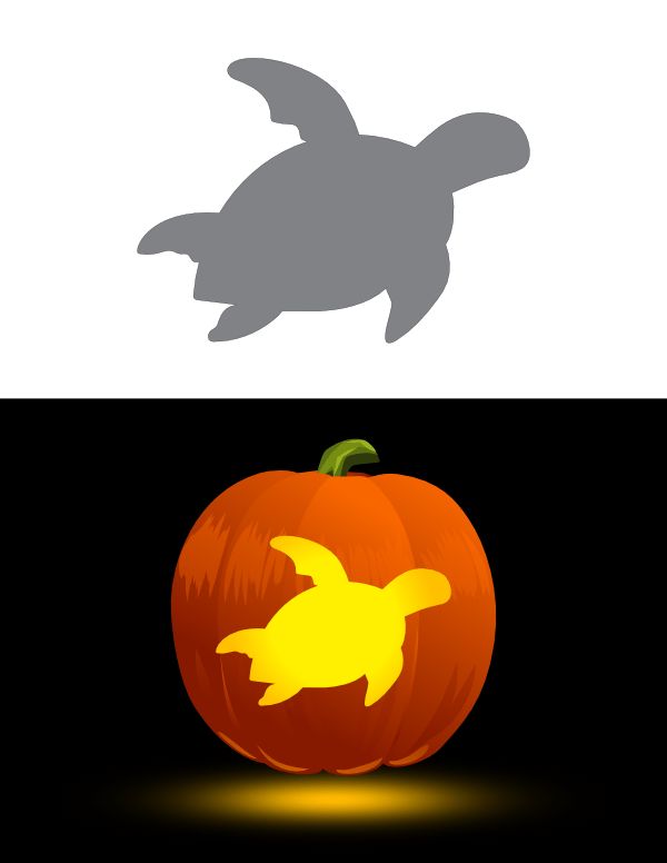 a pumpkin with an image of a sea turtle on it's face and the shape of a fish