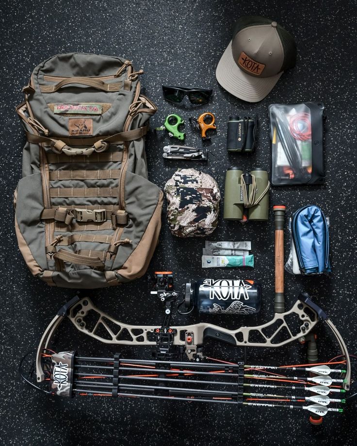 an assortment of fishing gear laid out on the ground