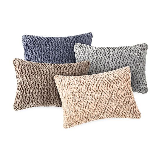 four pillows in various colors and patterns