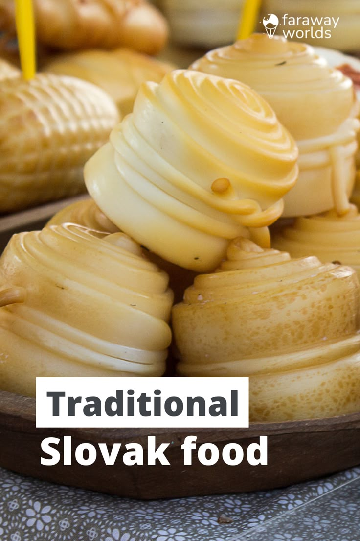 traditional slovak food is displayed on a table with candles in the background and text overlay that reads traditional slovak food