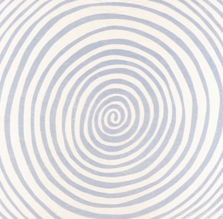 a white and blue striped wallpaper with circles in the center, on top of an off - white background