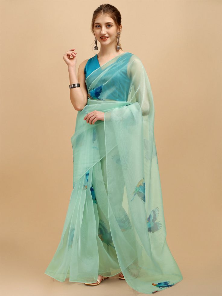 Sea green and blue sareeAbstract printed saree with no borderThe saree comes with an unstitched blouse piece, Check the image of the blouse piece to understand how the actual blouse piece looks like Long Saree Blouse Designs, Blue Organza Saree, Sea Green Saree, Bandhani Suit, Floral Organza Saree, Saree Painting, Blue Organza, Saree Sale, Saree Floral