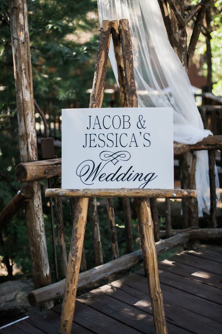 a wooden ladder with a sign on it