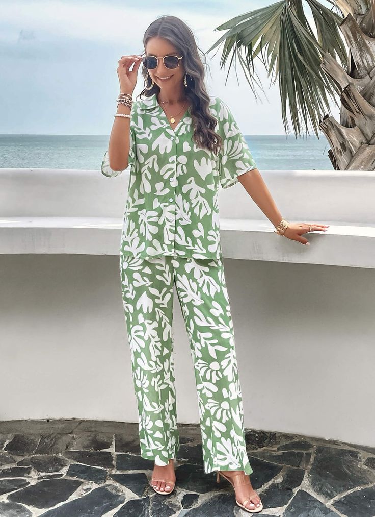 Get ready for some fun in the sun with our Beach Vacation Matching Set! This sage green set with palm leaf prints includes everything you need for a stylish and coordinated beach look. No need to stress about packing, we've got you covered. Soak up the sun and turn heads with this must-have set! Size Guide: Model is 5’ Casual Tropical Print Sets For Vacation, Green Relaxed Fit Sets For Summer, Casual Summer Green Set, Casual Floral Print Beach Sets, Tropical Floral Print Sets For Vacation, Tropical Floral Print Vacation Sets, Tropical Sets For Spring Day Out, Tropical Spring Sets For Day Out, Tropical Spring Day Out Sets