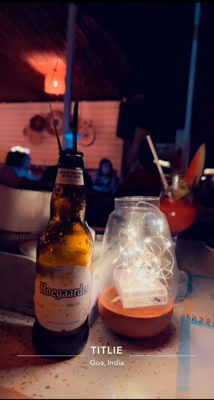 a beer bottle sitting on top of a table