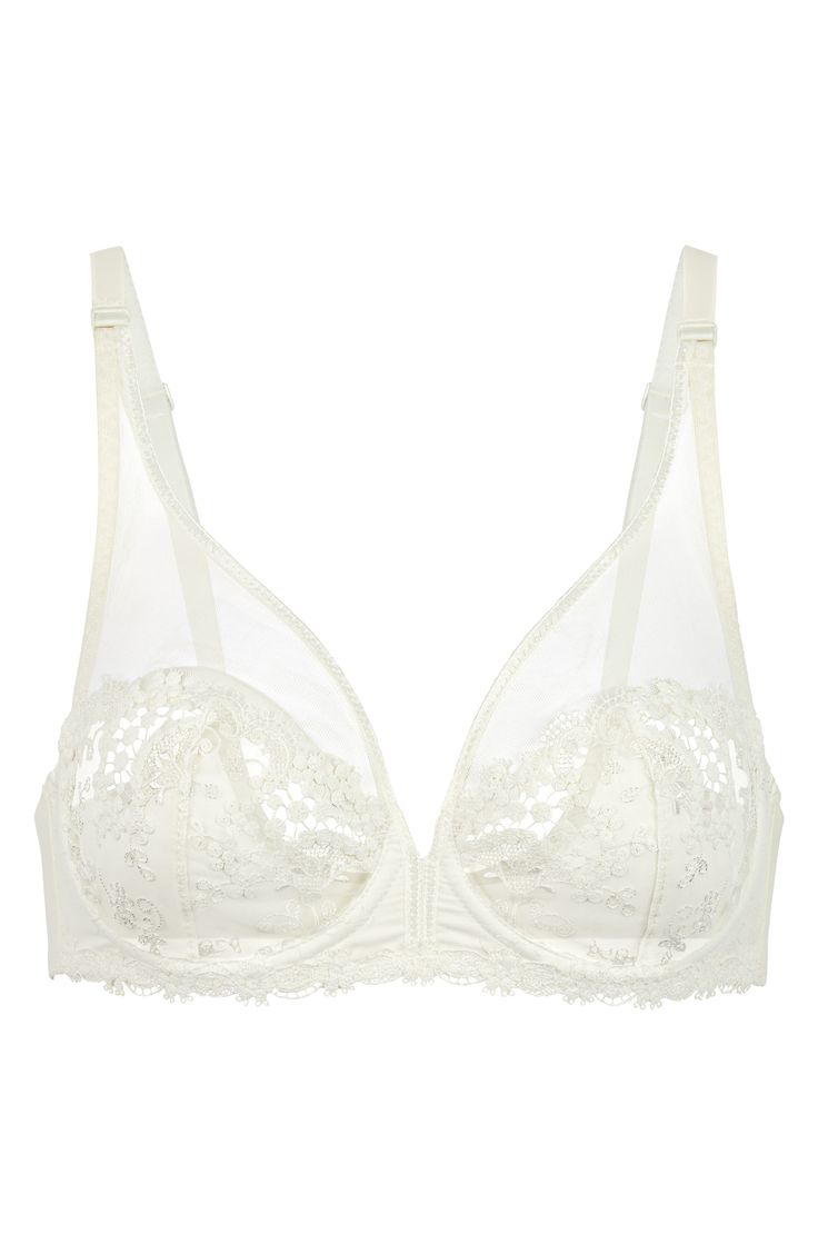 Vibrant blue embroidery veils the sheer tulle cups of this captivating, French-designed bra that's fashioned to give the illusion of a demi cup silhouette. Lined Polyester/nylon/elastane Hand wash, line dry Imported Lingerie Cream Lace Underwire Bra, Sheer Underwire Bra For Wedding, Lace Sheer Bra For Wedding, Elegant White Bra With Removable Cups, Wedding Sheer Underwire Bra, Wedding Underwire Sheer Bra, Delicate Lace Wedding Bra, Cream Underwire Bra With Delicate Lace, Wedding Bra With Removable Pads In White