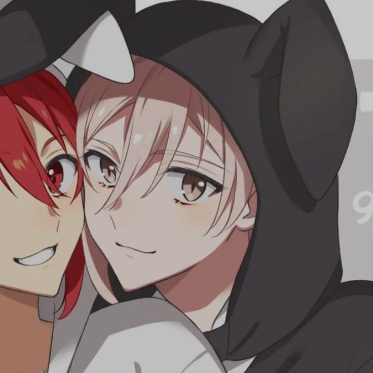 two anime characters with red hair and black cats on their heads, one is hugging the other