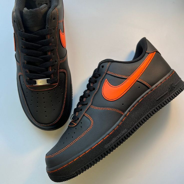 Orange stitched custom on an authentic black AF1. Sizing Details Air Force 1's run big, so we recommend customers choose a half size smaller than their usual size. **Sizes listed are Men sizes, equivalent women sizes can be seen in size chart on the last slide** Casual Black Custom Sneakers With Embroidered Logo, Black Casual Custom Sneakers With Embroidered Logo, Black Sneakers With Embroidered Logo, Black Sporty Sneakers With Contrast Stitching, Black Low-top Sneakers With Contrast Stitching, Black Classic Nike Air Force 1 For Sneaker Matching, Custom Black Sneakers With Round Toe, Black Custom Sneakers With Round Toe, Custom Black Round Toe Sneakers