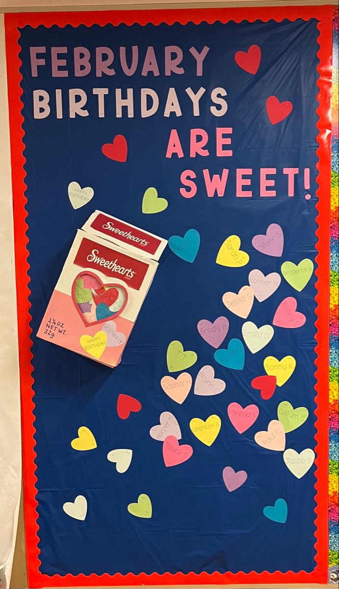 a bulletin board with hearts on it and a candy bar in the middle that says, february birthdays are sweet